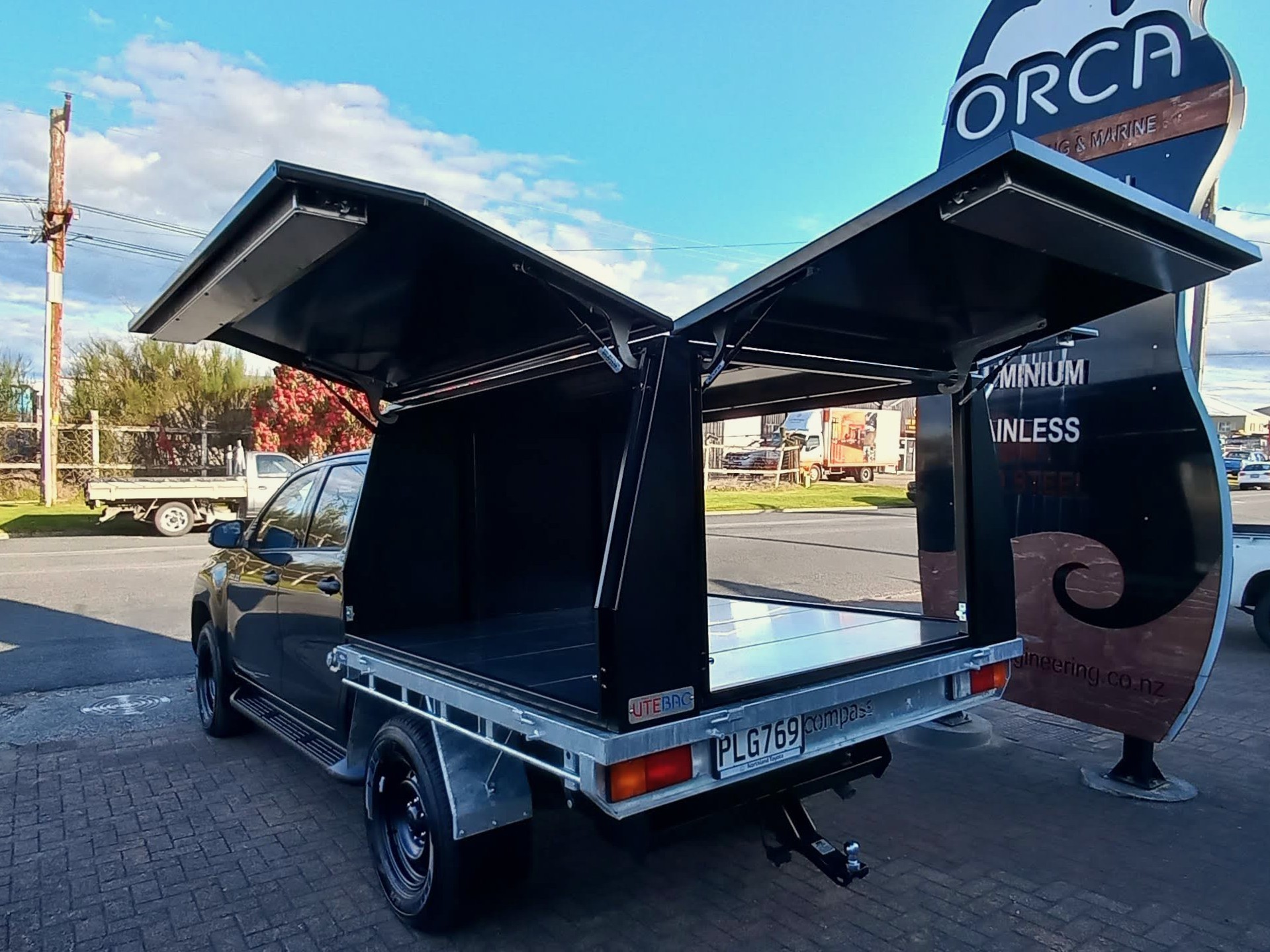 UTEBAC Removable Toolboxes showing quick-release mounting system on flat deck