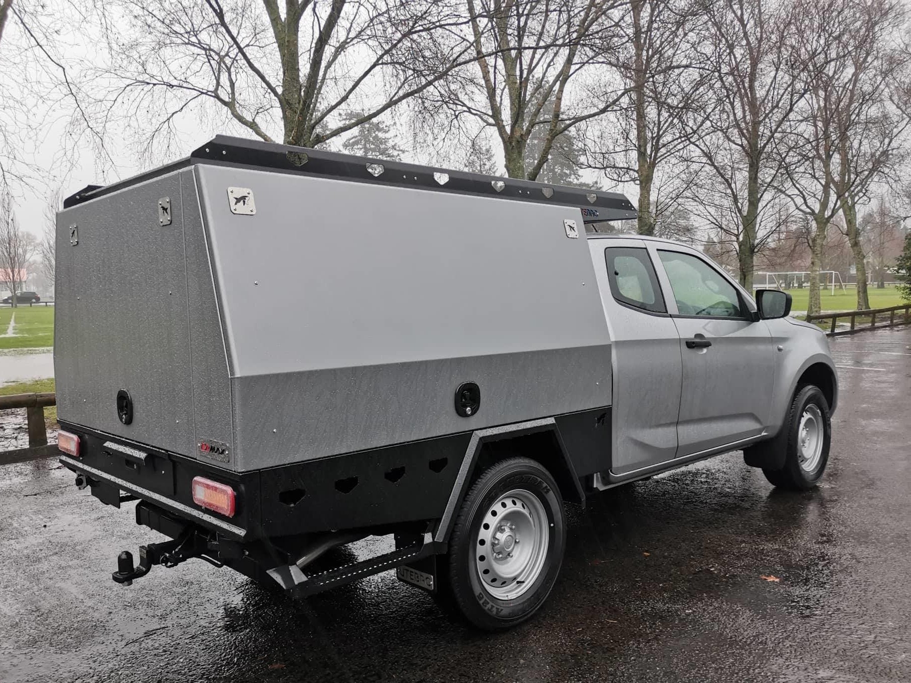 UTEBAC Service Body showing fully enclosed canopy with multiple door access